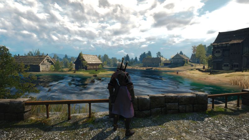 image showing a small waterside village