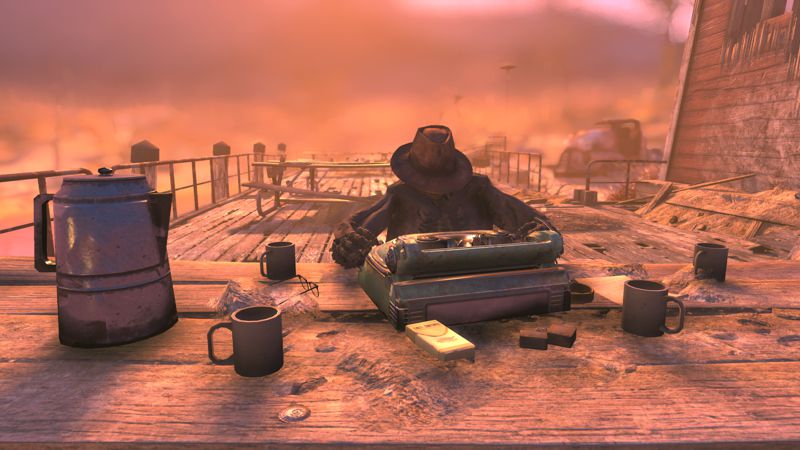 Image shows a person at a typewriter